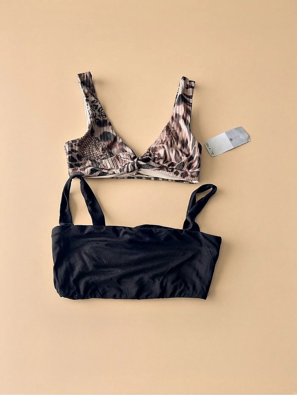 2 sports Bras Animal Print & Solid Black ASOS & Naked Wordrobe